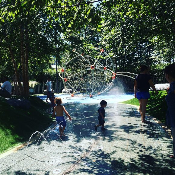 Playground and splash pad to cool off in the summer sun.